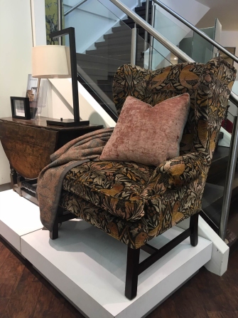 Columbia wing chair covered in Jim Dickins Fabric, Milongo collection, Ruskin, colour Autumn